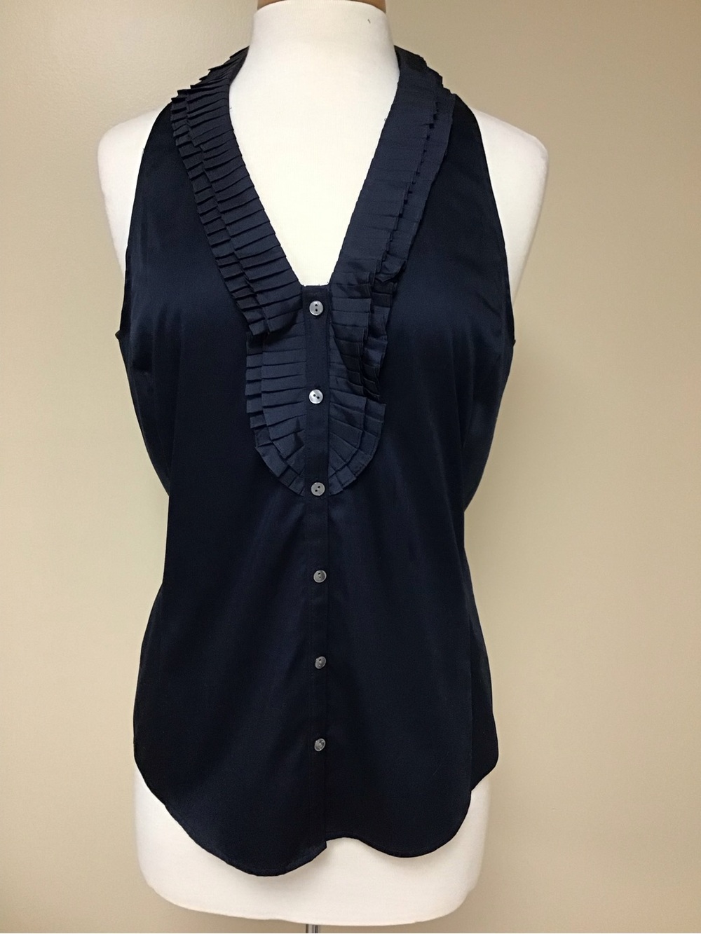 Ann Taylor Navy Sleeveless blouse with silk ruffle neck